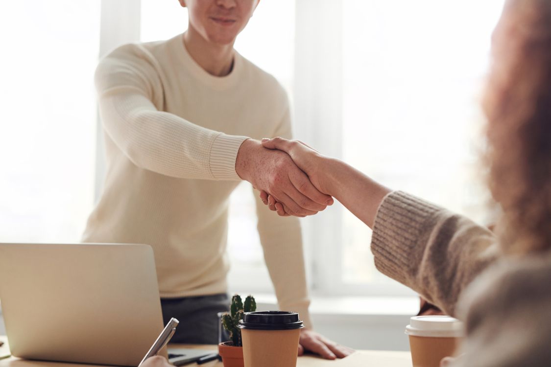Handshake when hiring a property manager in Australia