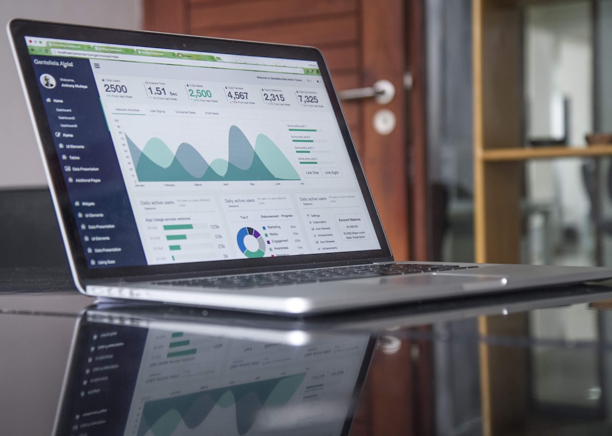property investment tools australia — laptop with data charts